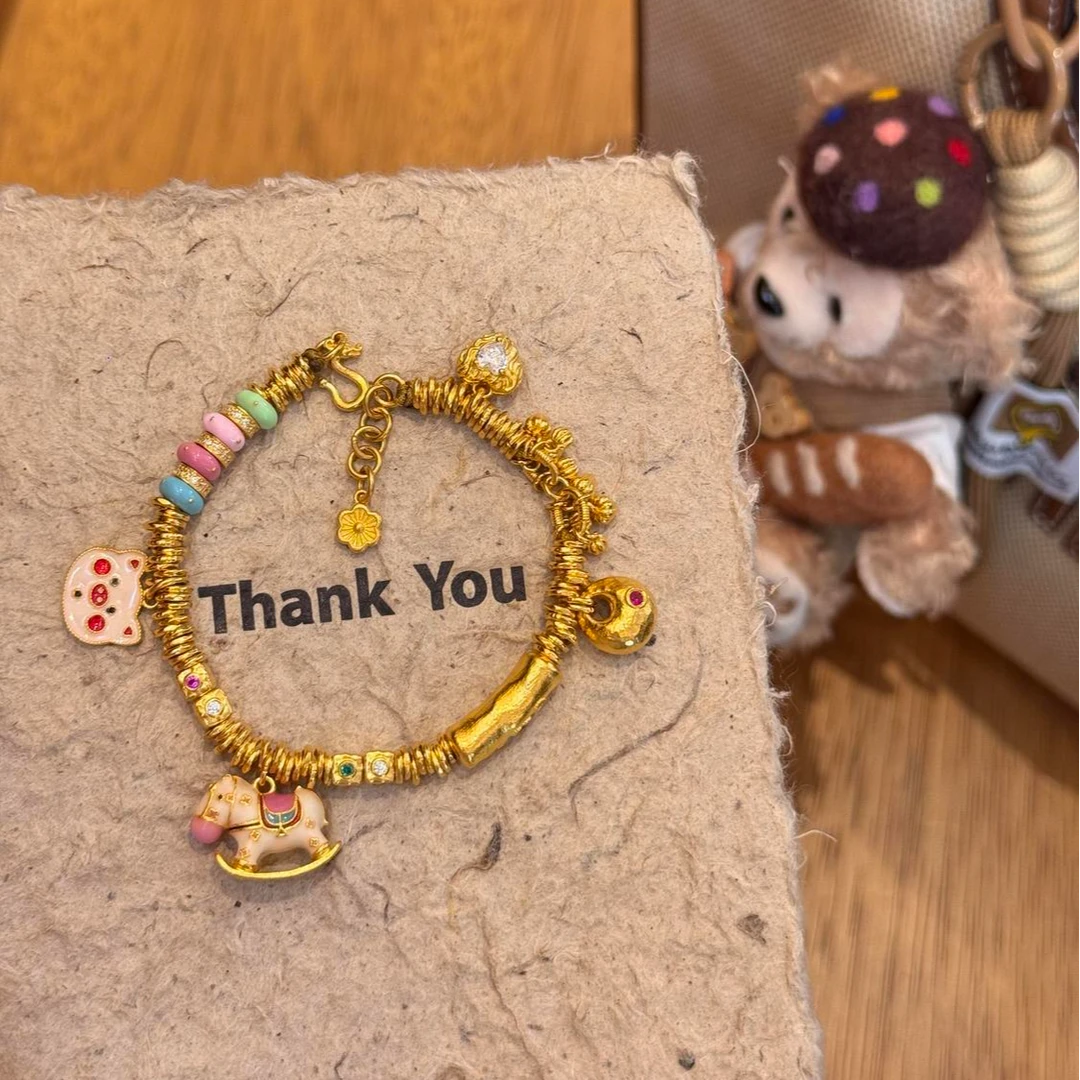 铜合金手链 多巴胺女手链小众高颜值新款古法黄金色摇摇木马盘缠