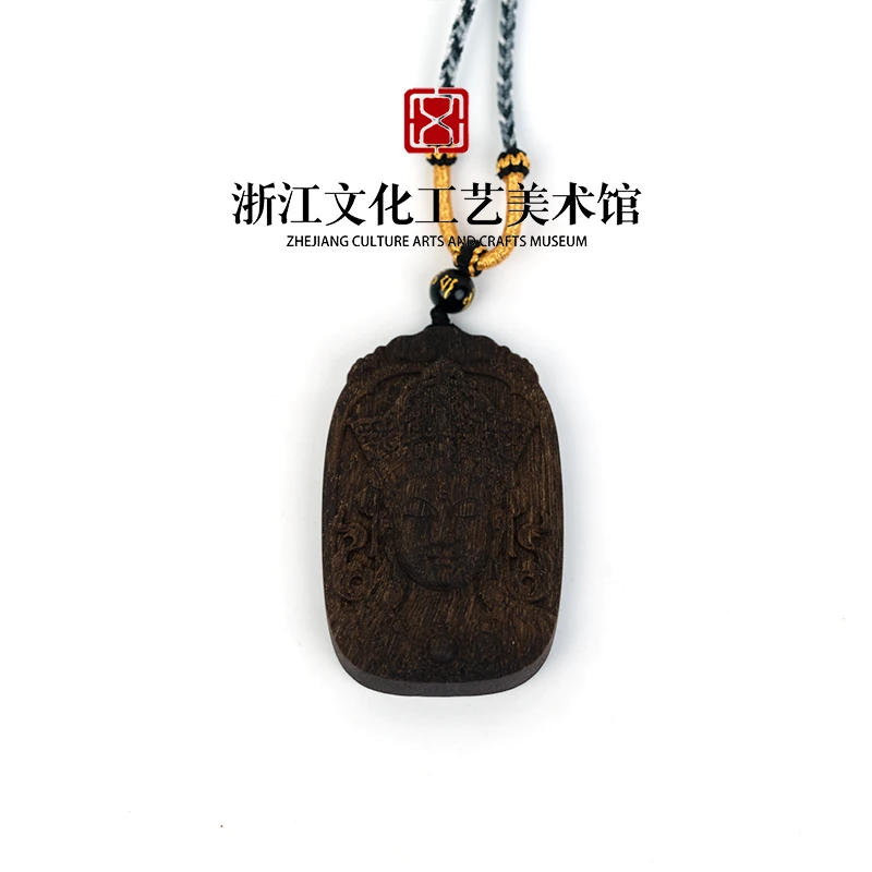 C454 【观音】文莱黑奇楠树心油沉水吊牌 23.32g