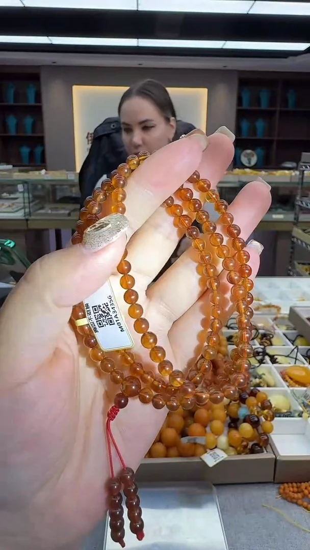 琥珀颈饰未镶嵌54秒拍号 假一罚三