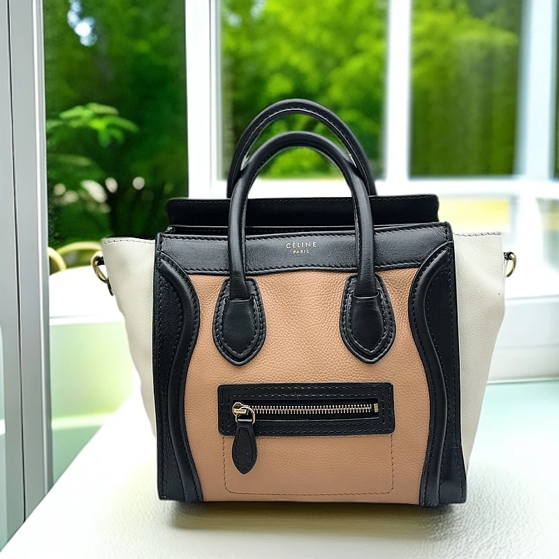 95新 思琳 笑脸拼色手提包1167 7384