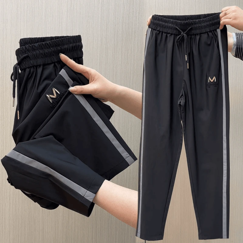 新款韩版休闲裤女高弹简约百搭显瘦宽松时尚潮流九分裤运动速