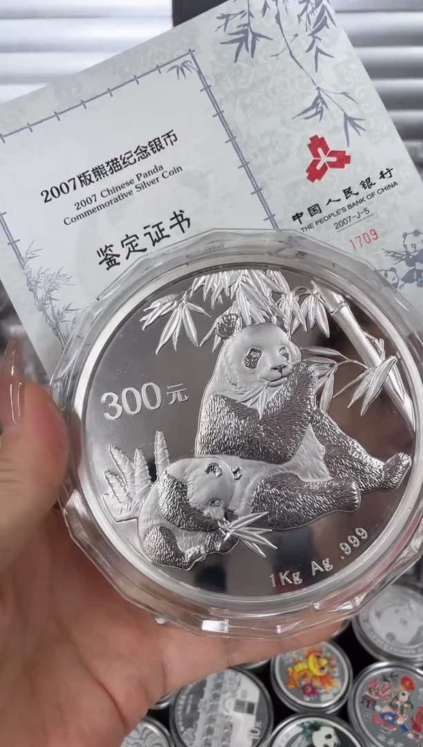 纯银2007公斤银猫1000克原证盒