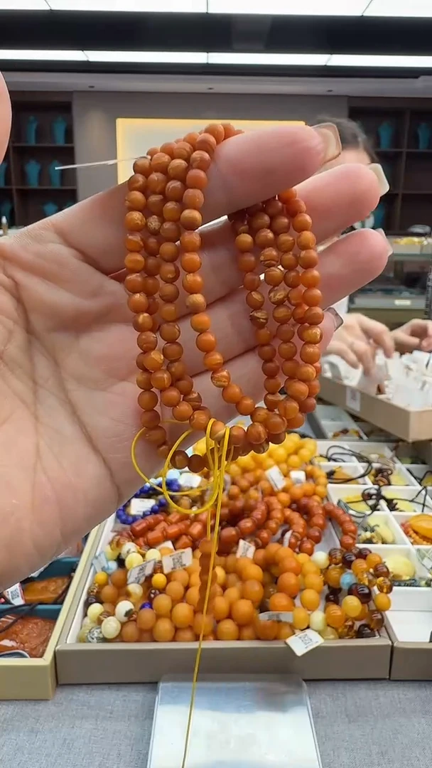 琥珀颈饰未镶嵌45秒拍号 假一罚三