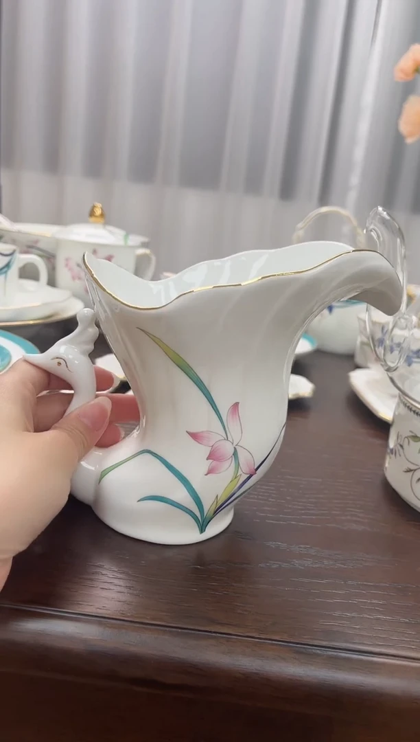 杯兰花高骨骨瓷孔雀摆件