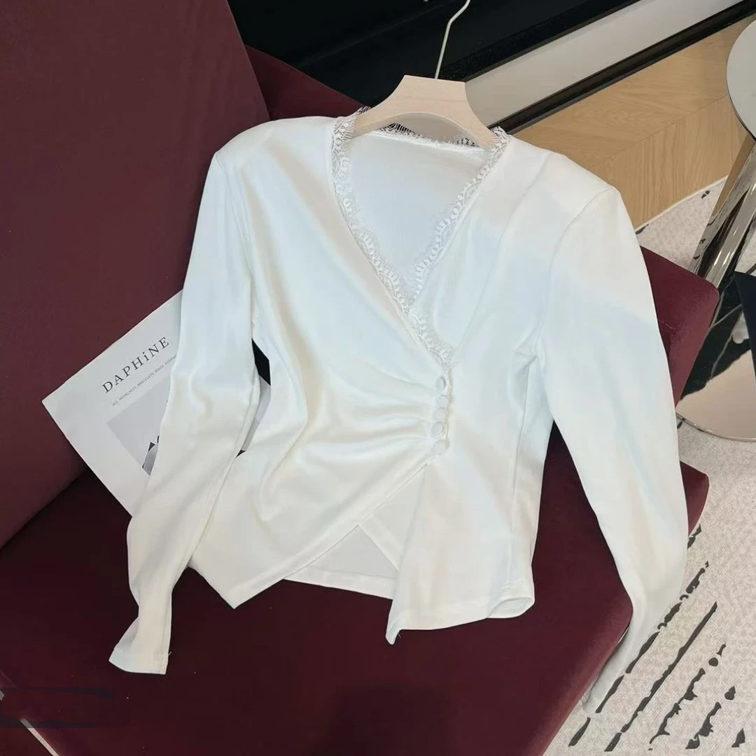设计感斜边不规则单排扣长袖上衣女2025新款春季纯色修身显瘦T恤