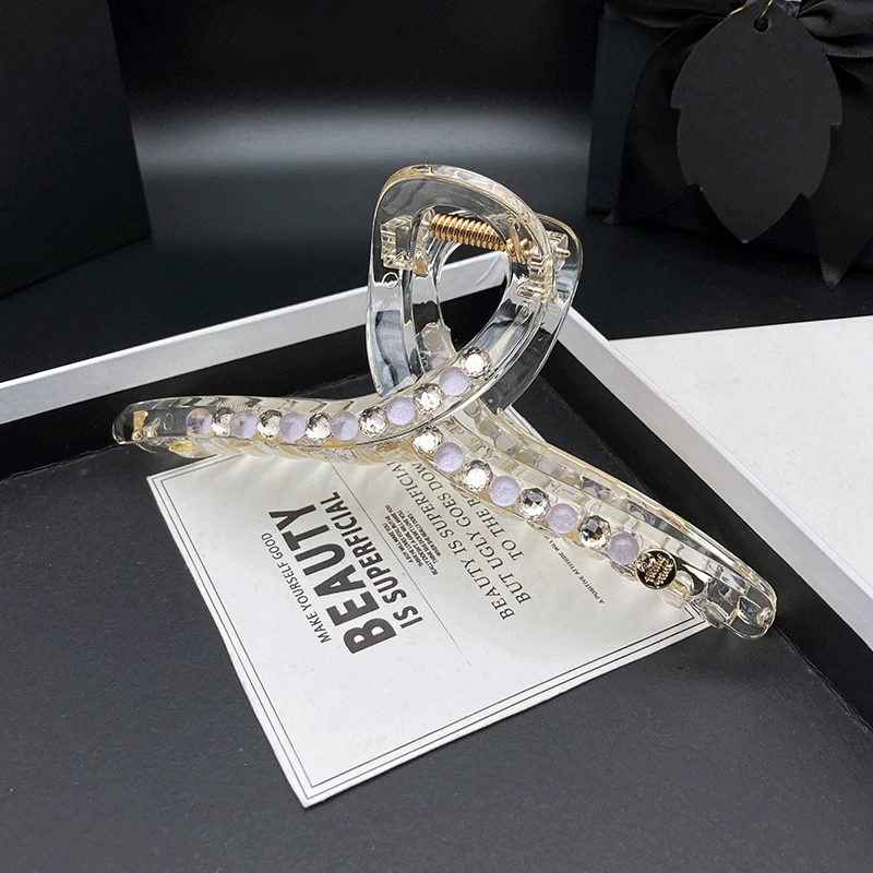 发夹女2025夏季新款高级感香槟高端冰透感镶钻抓夹后脑勺盘发头饰