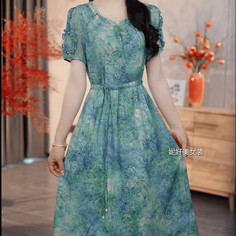 2025夏季新款时尚优雅气质高端精致花色修身减龄收腰中长款连衣裙