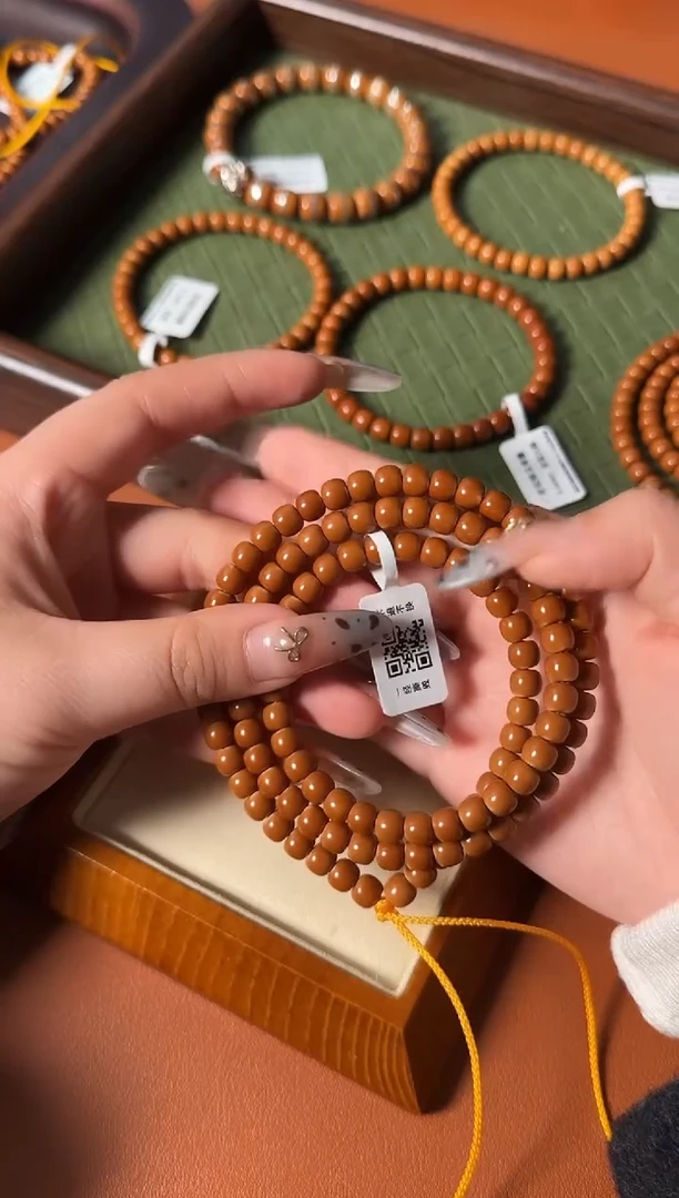 手串橄榄核6.5mm老挝核尖老型108、正三花一条毕业