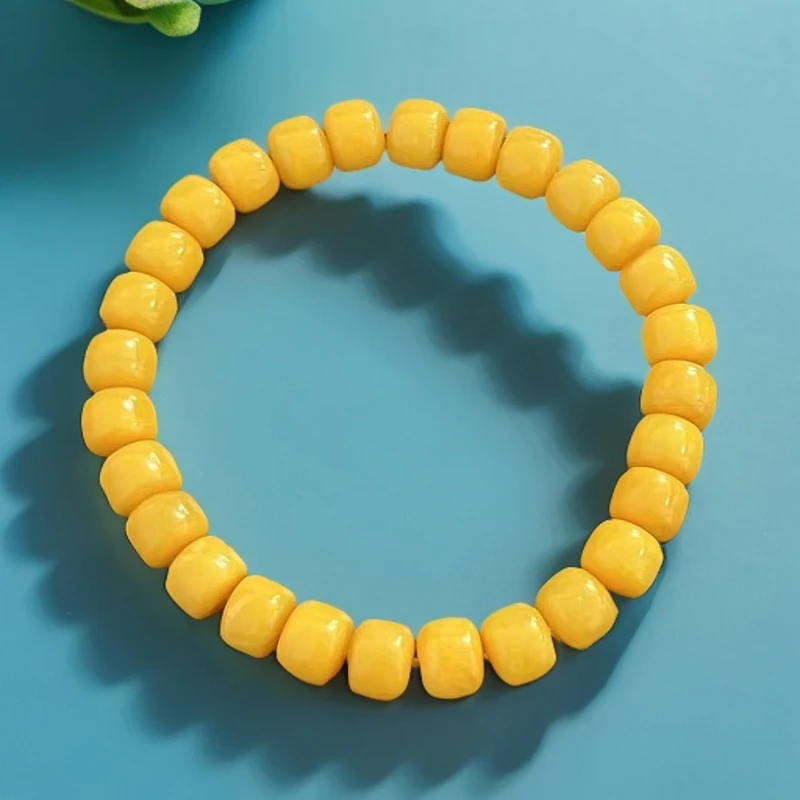 【巨伶石】鸡油黄老型桶珠蜜蜡单圈素圈手串