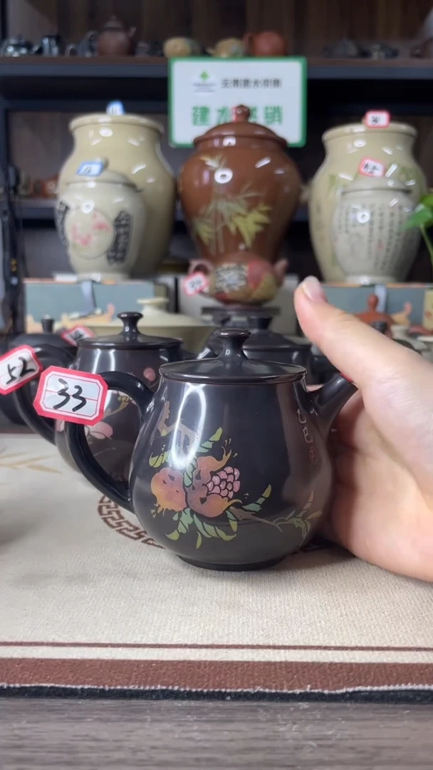 财****华建水紫陶亮光刻填壶