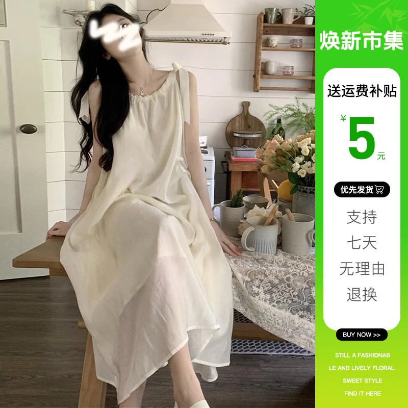 7649海边度假白色吊带连衣裙子女夏季2025新款显瘦气质法式长裙