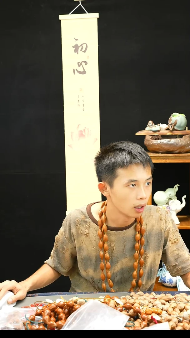 手串橄榄核21.28梅林红核200
