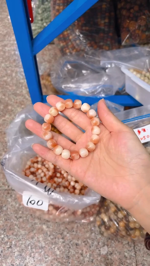 吊坠菩提根/象牙果粉色单圈手串