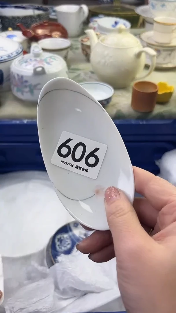 瓷片逾****者606........