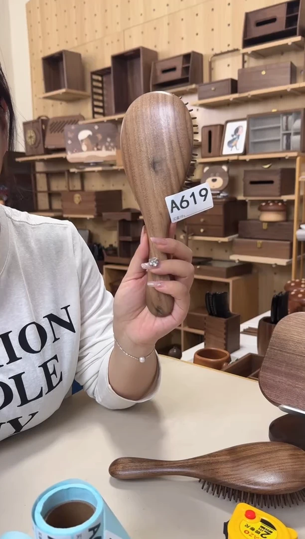 木619微瑕北美黑胡桃圆形大号气垫梳