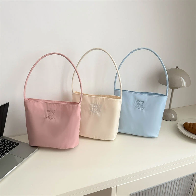 韩国手提包上班族便携手提袋2025新款刺绣腋下包百搭单肩水桶包女