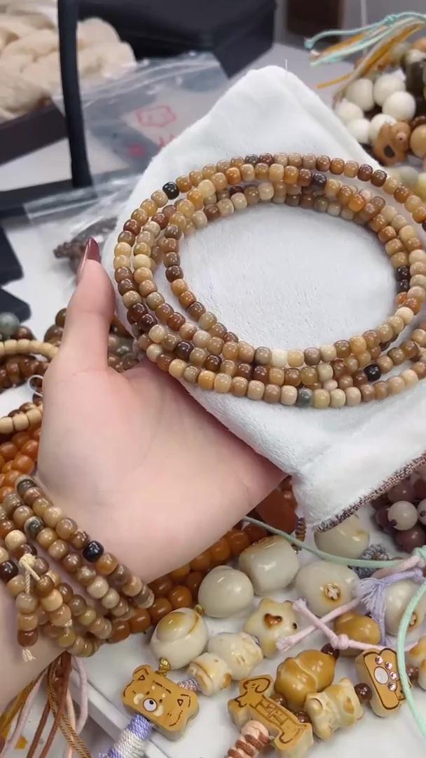 手串菩提根/象牙果玉化花皮龙脊桶珠6*7mm念珠·有钥匙孔