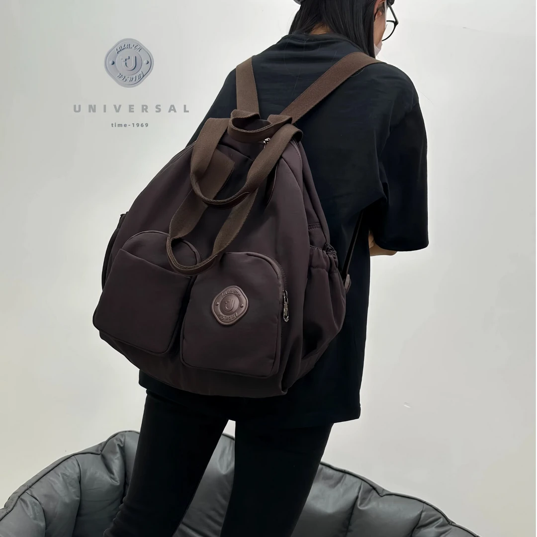 U.T新款休闲大容量单肩手提包日常大容量男女同款加宽加大双肩包