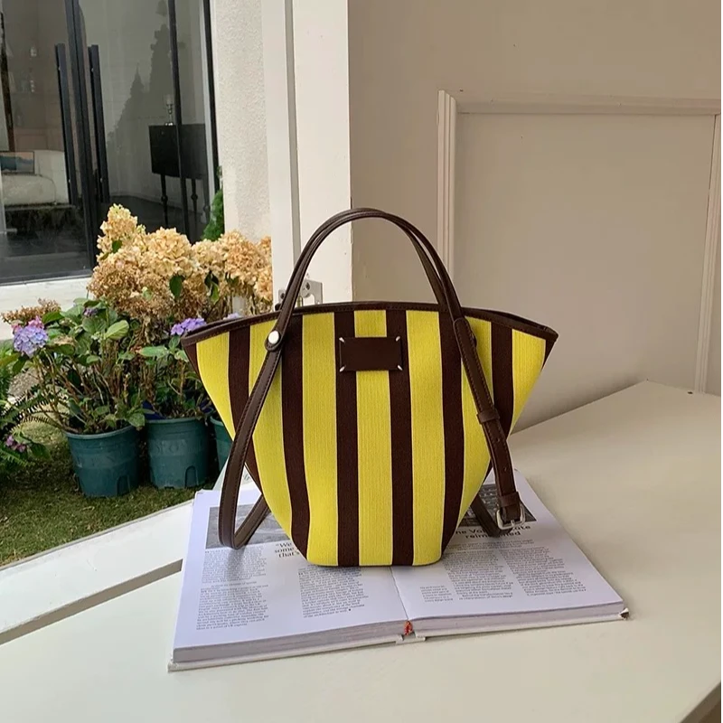 条纹撞色水桶包包女式2025春夏季高级感小众大容量手提单肩托特包