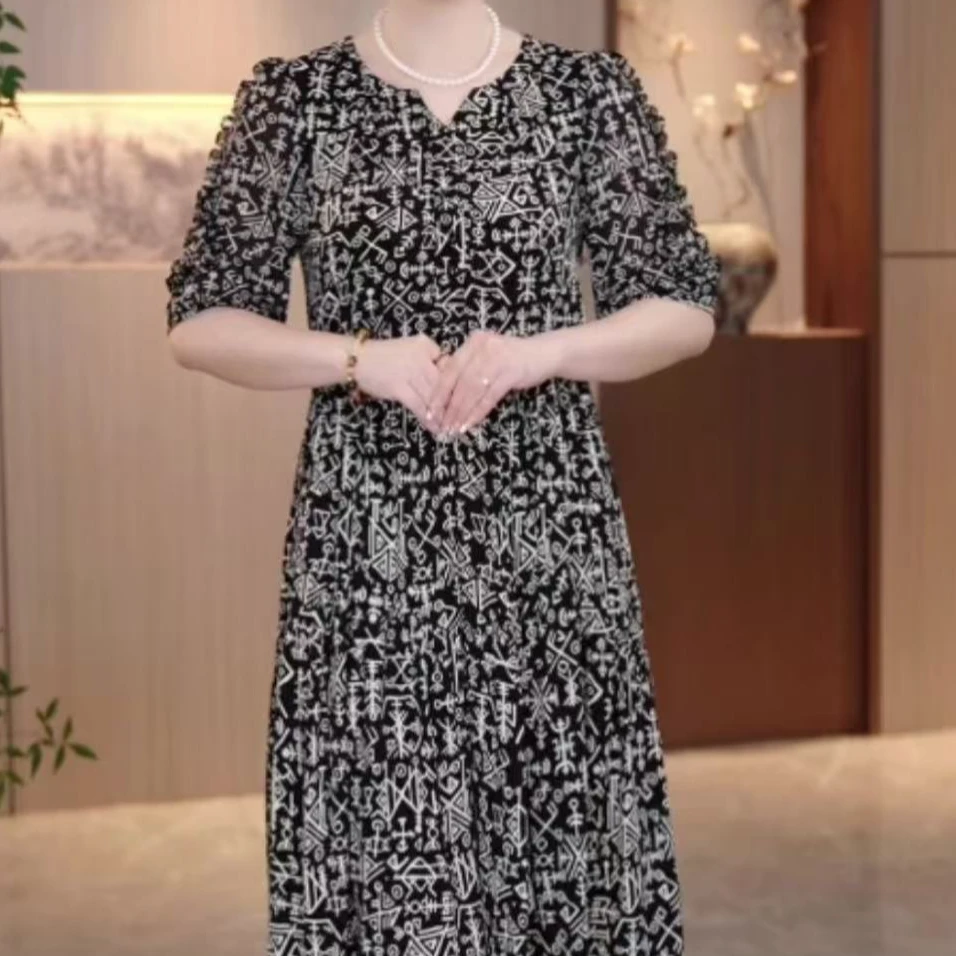 时尚洋气碎花减龄连衣裙001夏季新款气质妈妈显瘦遮肉度假裙子