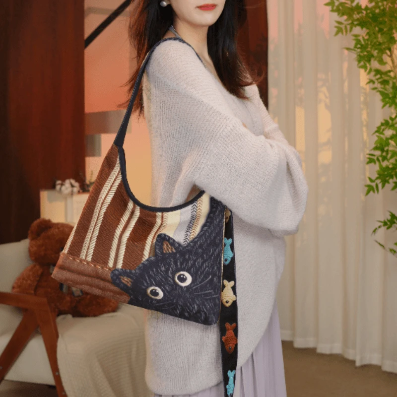 艺术家拉链款休闲百搭单肩斜跨通勤风可爱喵影织梦托特包