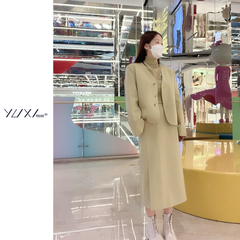 新款简约前侧开叉气质高腰半身裙小众显瘦时尚