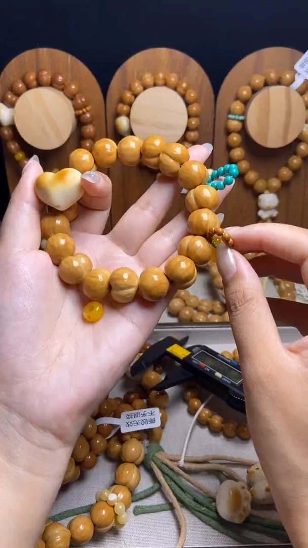 手串猴头核桃果***?全品聚宝盆爱心绿跑环蜜隔片橄榄壳吊坠（南）串