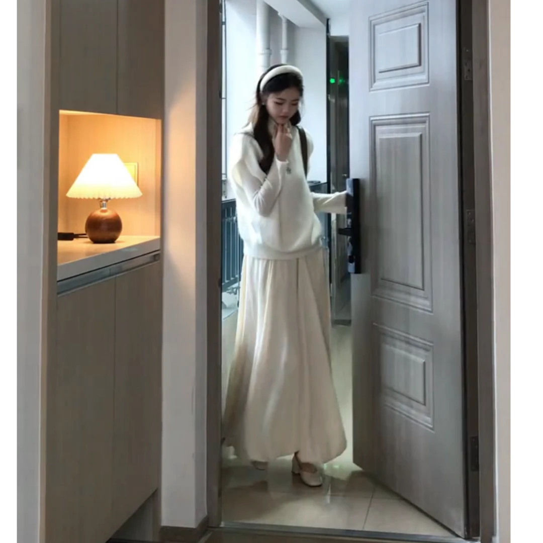 2025秋冬新款女装温柔时尚洋气针织马甲上衣收腰显瘦高腰半身裙子