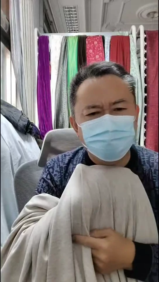 米驼色雪花软弹布料