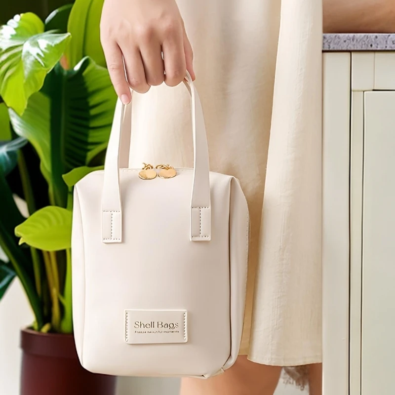 化妆包包女款爆款2025新款防水手提化妆品收纳包外出便捷旅行简约