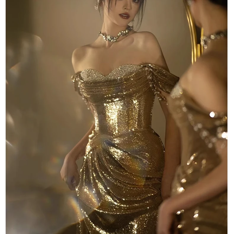 金色晚礼服女高级感亮片主持人一字肩抹胸敬酒服新娘鱼尾裙小拖尾