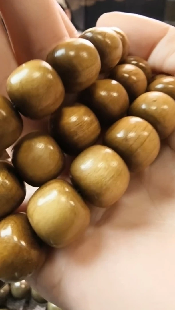 金丝楠1.3.1.4阴沉黄手串桶珠