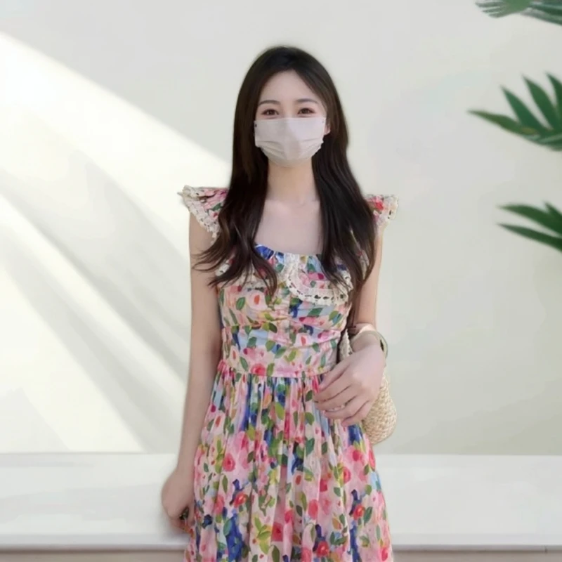 茶歇法式油画碎花小飞袖连衣裙女夏季露肩海边度假甜美公主长裙子