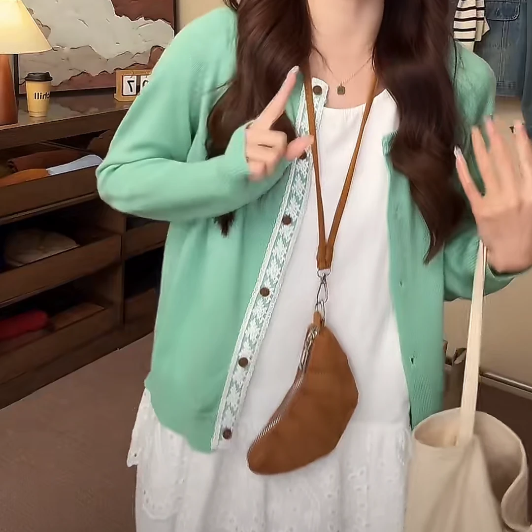 韩系圆领单排扣绿色长袖开衫上衣女2025春季新款纯色通勤百搭毛衣