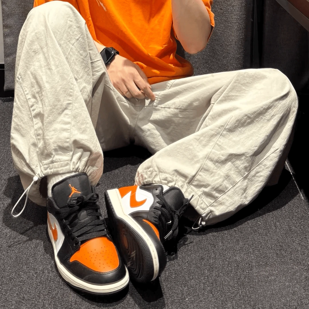 Nike耐克正品男鞋AJ1扣碎黑橙低帮流光风运动休闲板鞋553558-081