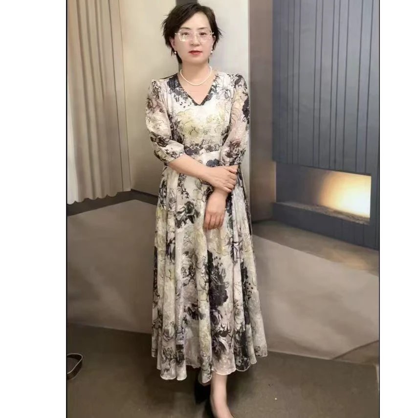 剪花香槟金长款过膝大摆高端连衣裙