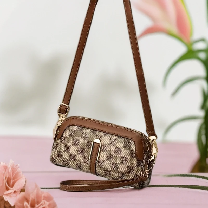 【极速发货】真皮质感包包女2025春季新款手拿包双隔层手机包单肩包