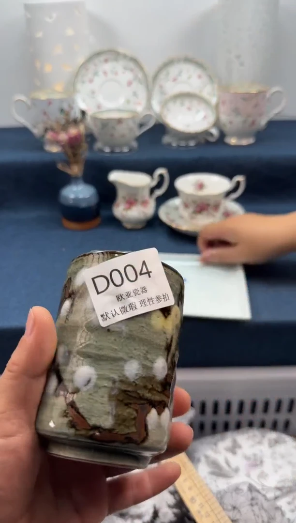 瓷片哈*?          D004