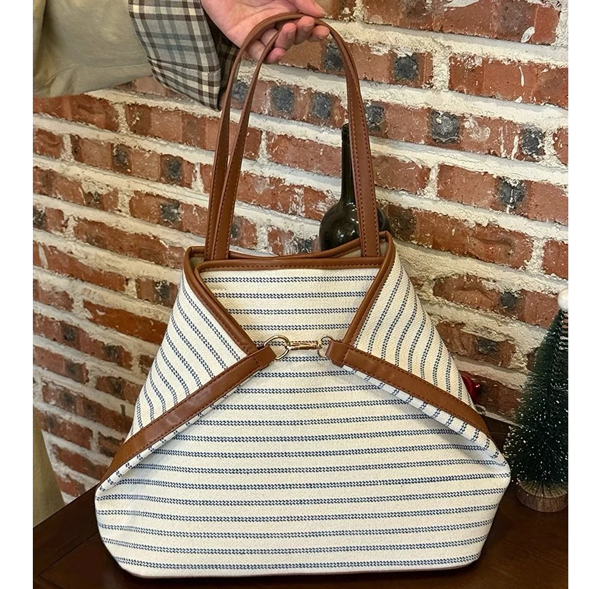 韩系大容量托特包女2025新款高级感通勤单肩帆布包小众百搭腋下包