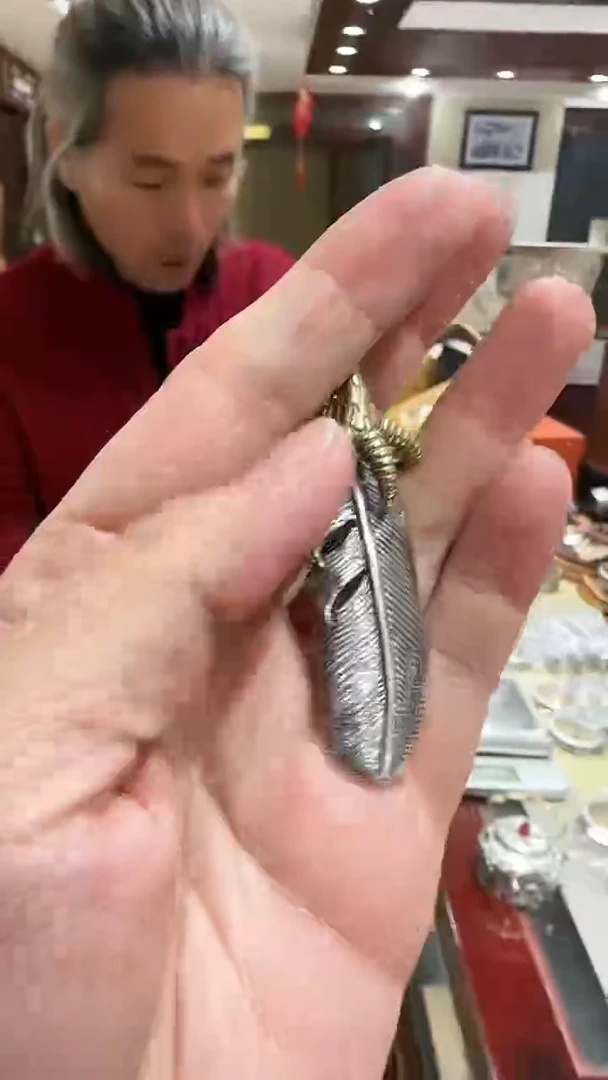 足银精工手工羽毛鹰爪茶摆件