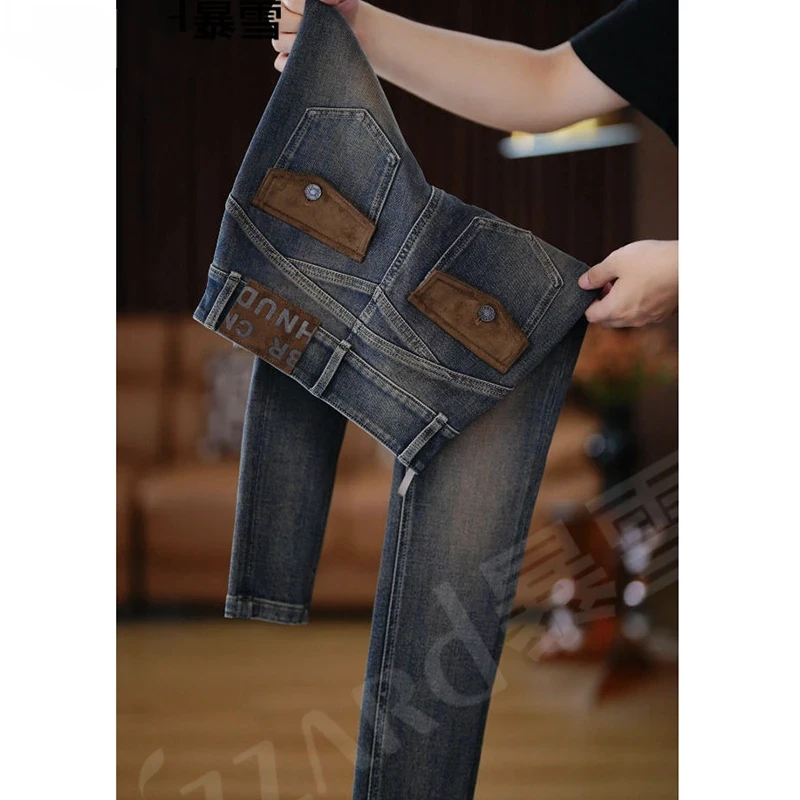 【琥珀流光】“北欧摩登”设计感撞色提臀高腰牛仔裤女2025秋季小