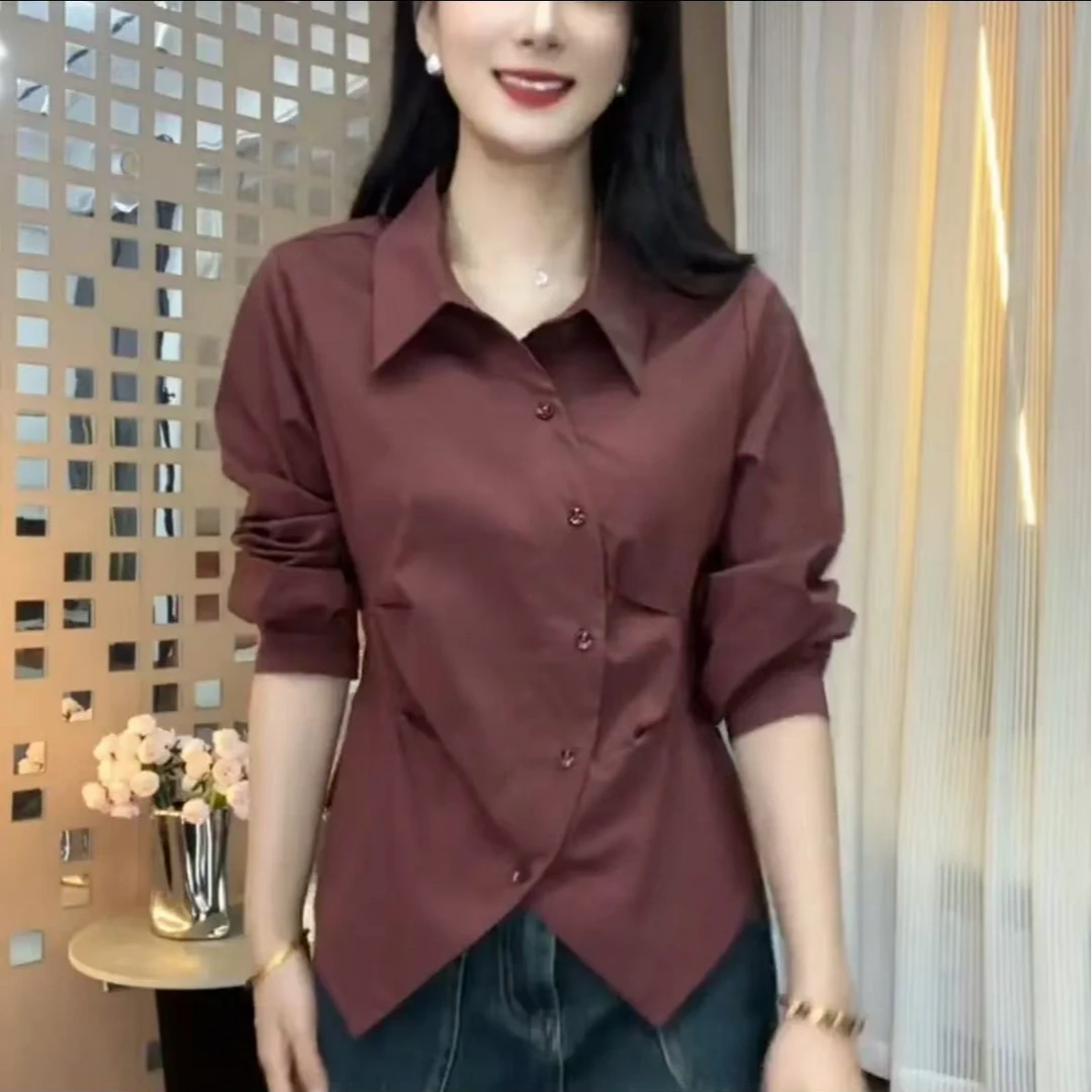 新款衬衫领纯色不规则高定纽扣洋气百搭气质时尚减龄显瘦长袖小衫
