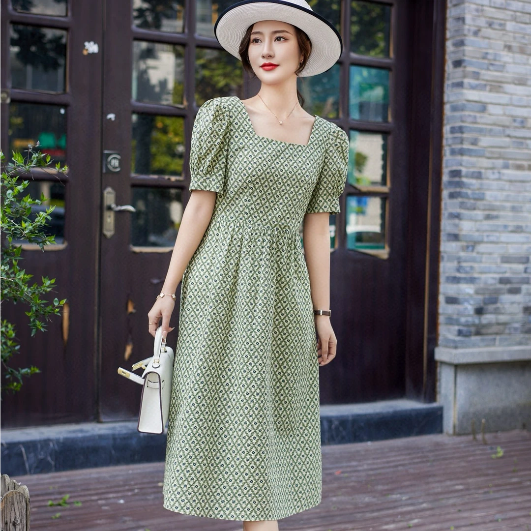 405气质绿色碎花夏天连衣裙2025新款爆款设计感遮肚子显瘦A字裙子