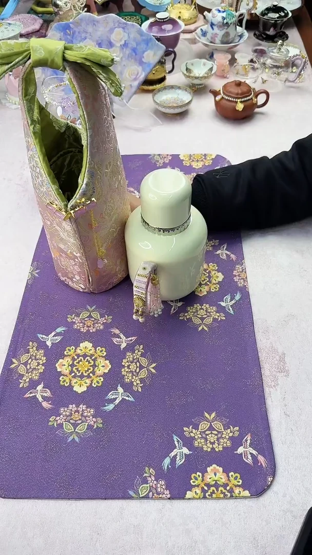 47东方米白600cc壶 带编织带包包