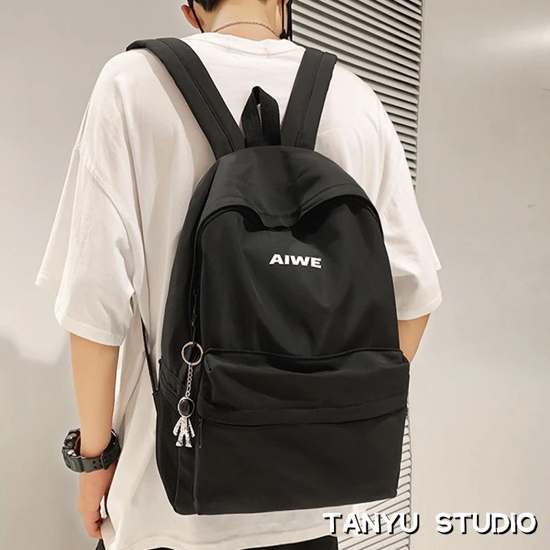 探屿潮牌旅行电脑背包男士双肩包女简约休闲初中生高中大学生书包