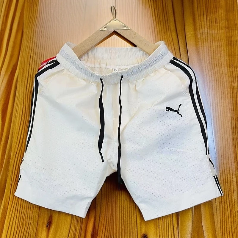 794夏季新款休闲透气打孔潮流时尚空调透气短裤