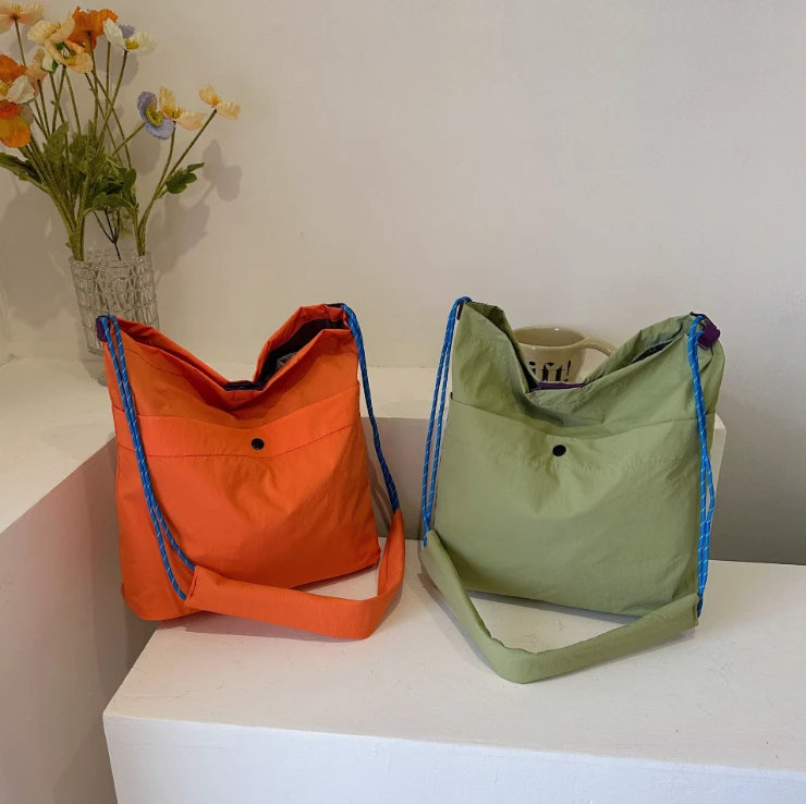 25新款男女情侣户外机能极简皱感轻便运动防泼水斜跨斜挎单肩包大