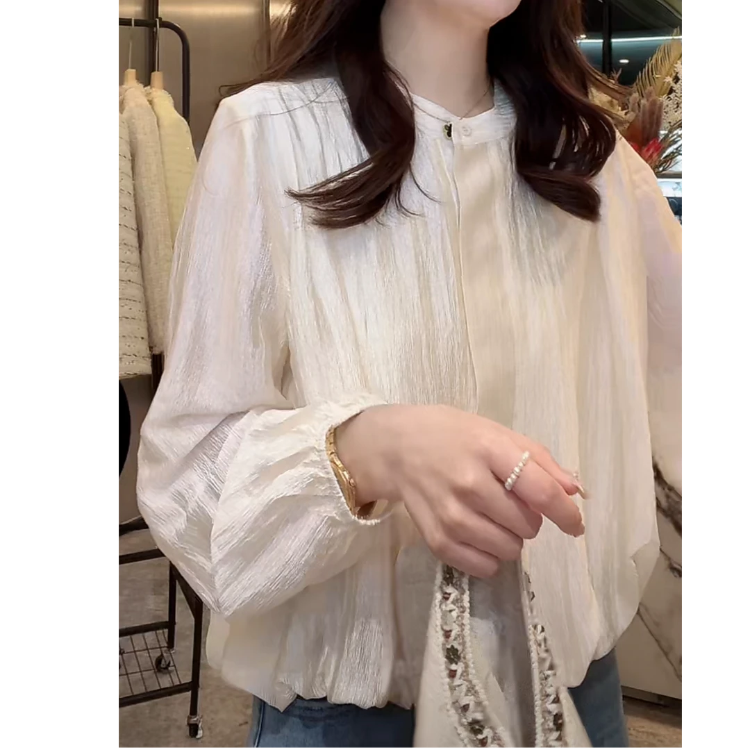 设计感纽扣纯色圆领衬衫女2025春季爆款洋气优雅风外穿长袖衬衣