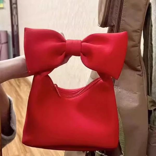 小众设计甜美蝴蝶结手提包2025新款韩系简约百搭手腕包迷你云朵包