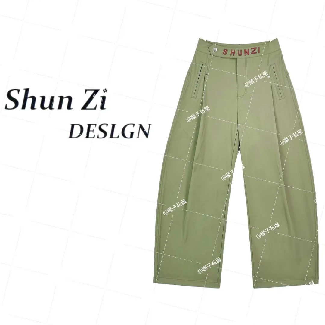 顺子/SZ7101 夏季抗皱免烫欧美酷帅刺绣排扣显瘦窄版小弯刀裤